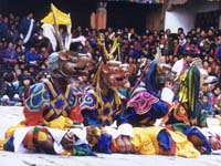 Dansers tijdens Festival in Thimphu - Bhutan - parel van de Himalaya